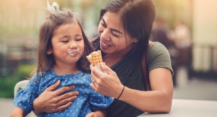 mom eating ice cream with child