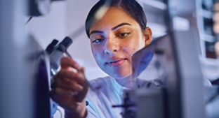 Scientist preparing microscope slides